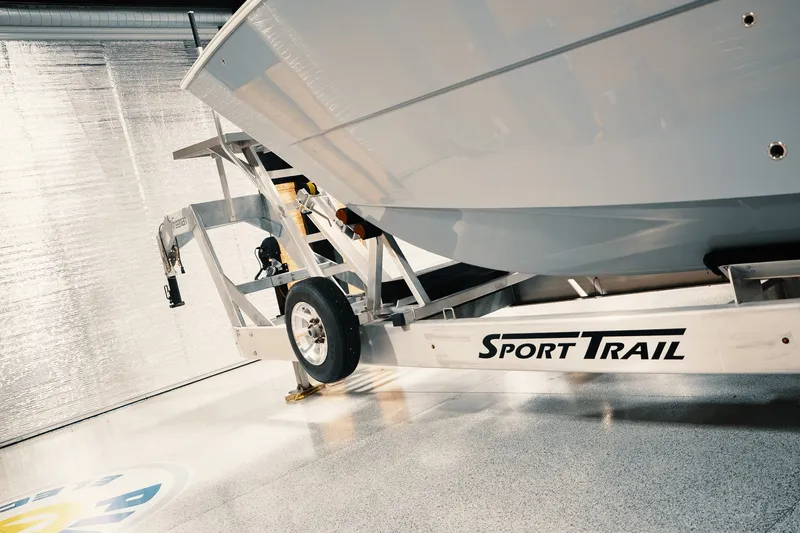 Slide: The Image of 2023 Freeman 42LR boat on Sport Trail trailer in a garage. - 29