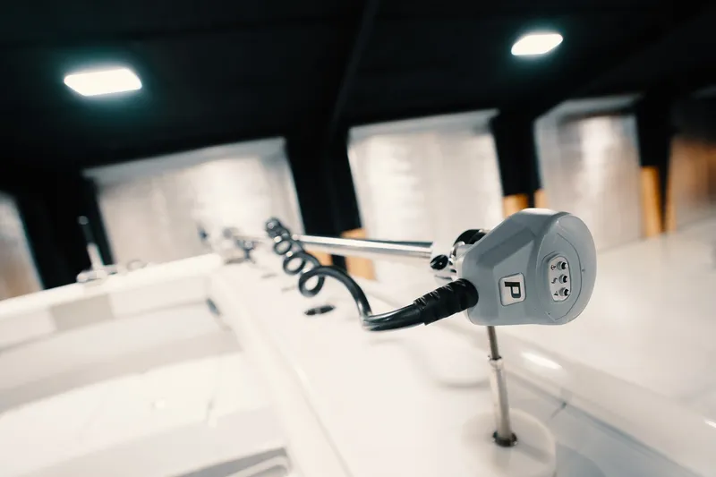 Slide: The Image of Close-up of 2023 Freeman 42LR boat's control panel in a well-lit interior. - 84