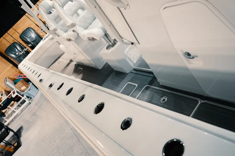 Slide: The Image of Interior view of 2023 Freeman 42LR boat, featuring sleek seating and modern design elements. - 91
