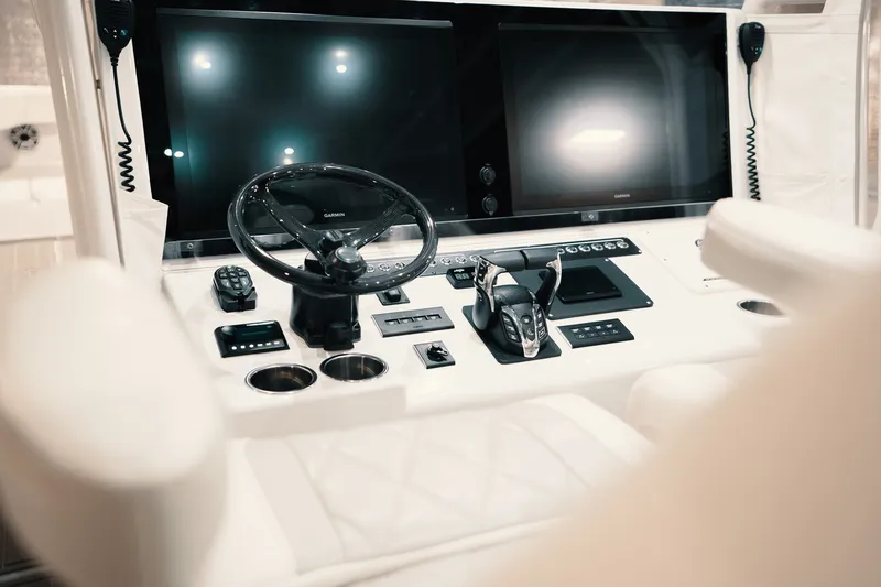 Slide: The Image of Luxury boat cockpit with dual screens and controls, Freeman 42LR, 2023 model. - 71