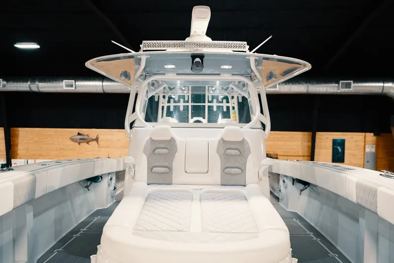 Slide: The Image of 2023 Freeman 42LR boat interior with luxurious seating and modern design. - 77