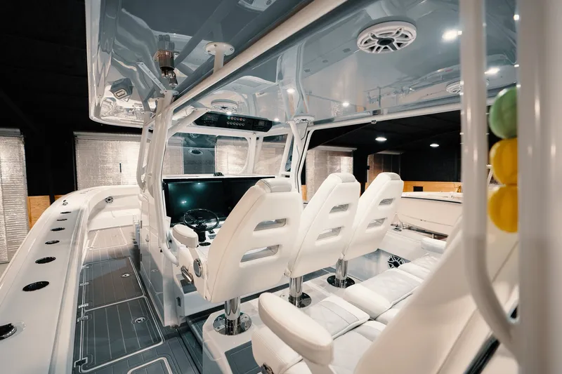 Slide: The Image of Luxurious interior of 2023 Freeman 42LR boat with modern seating and controls. - 66