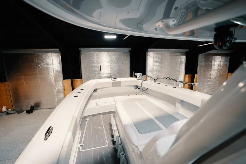 Slide: The Image of 2023 Freeman 42LR boat interior in a garage with metallic walls. - 75