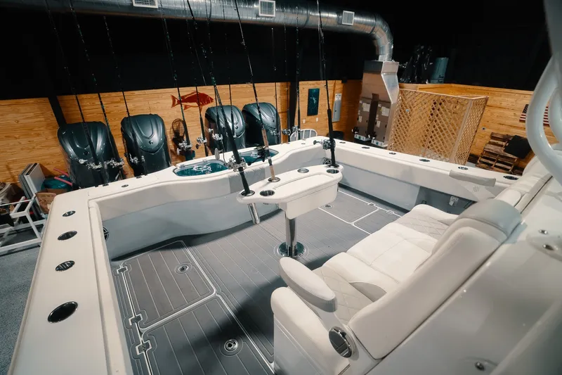 Slide: The Image of Luxurious 2023 Freeman 42LR boat interior with fishing rods and seating. - 46