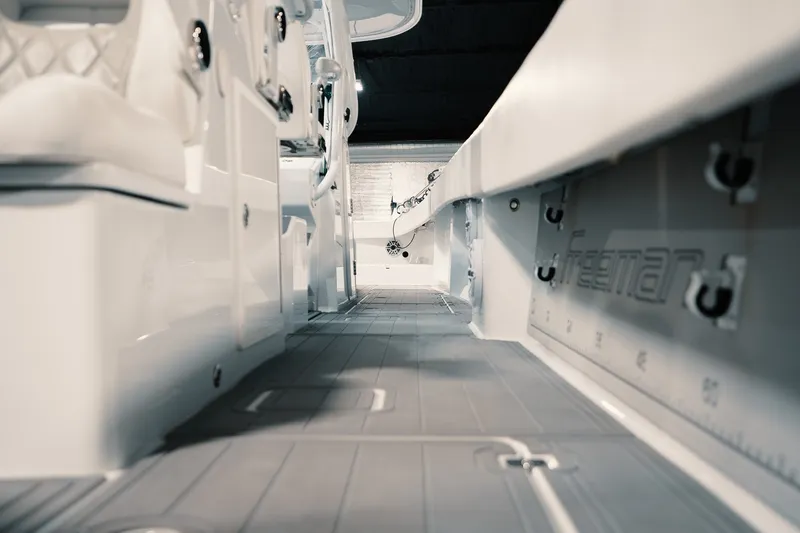Slide: The Image of Interior view of 2023 Freeman 42LR boat, showcasing sleek design and spacious layout. - 54