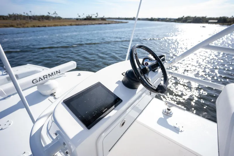 Slide: The Image of Freeman 42LR 2023 boat helm with Garmin navigation on a sunny day. - 18