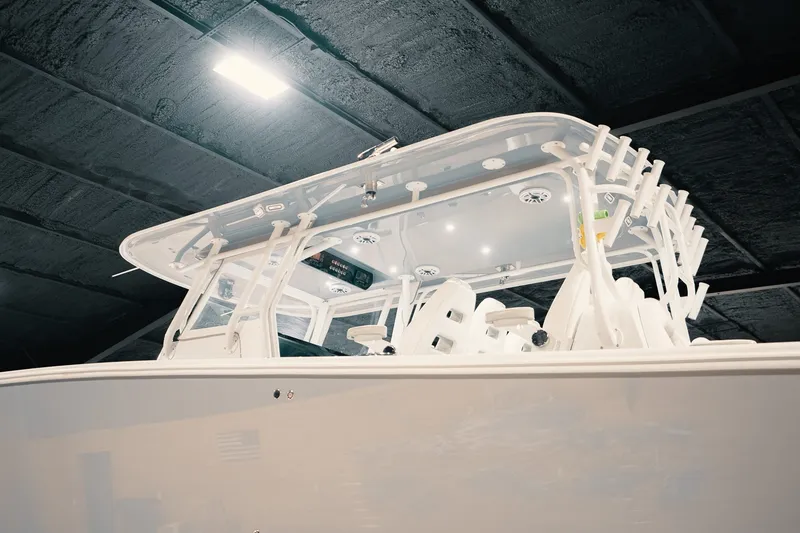 Slide: The Image of 2023 Freeman 42LR boat interior with modern design and advanced features, under bright lighting. - 92