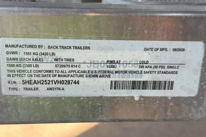 Slide: The Image of Label on trailer showing specifications and compliance details, manufactured by Back Track Trailers. - 15