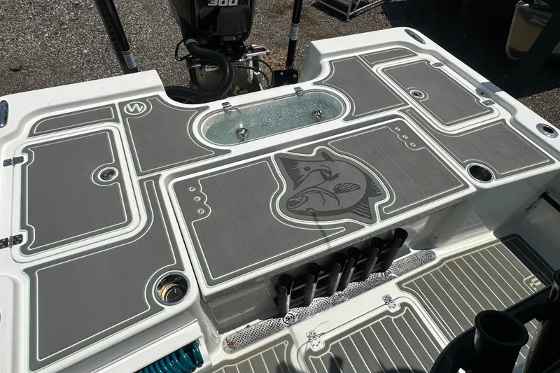 Slide: The Image of 2018 Sea Pro 248 Bay boat deck with custom non-slip flooring and fish design. - 15