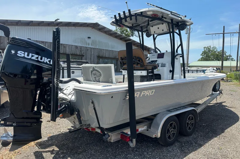 Slide: The Image of 2018 Sea Pro 248 Bay boat on trailer with Suzuki outboard motor. - 4