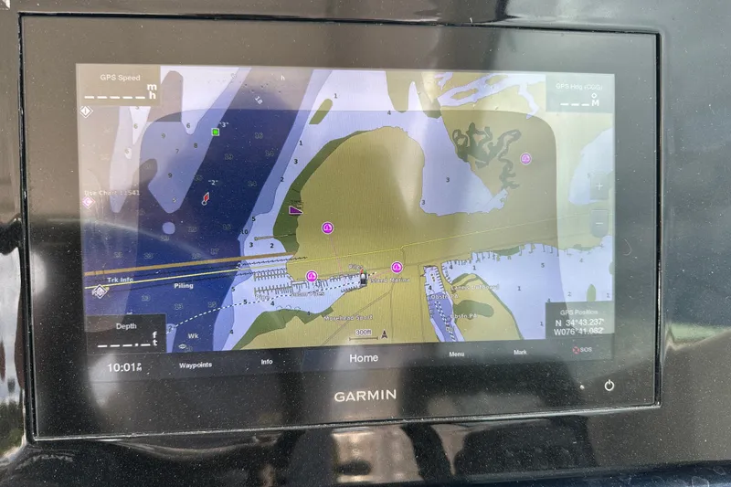 Slide: The Image of Garmin GPS display on 2021 Pursuit DC 266 Dual Console boat. - 19
