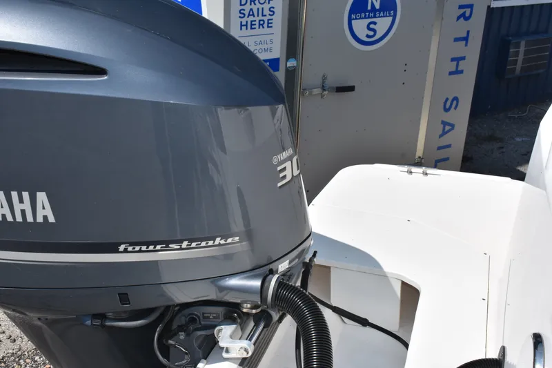 Slide: The Image of Yamaha 300 four-stroke outboard motor on a 2019 Ranger Tugs R-27 boat. - 10