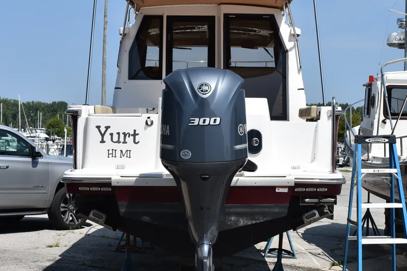 Slide: The Image of 2019 Ranger Tugs R-27 boat with Yamaha 300 engine at marina. - 6