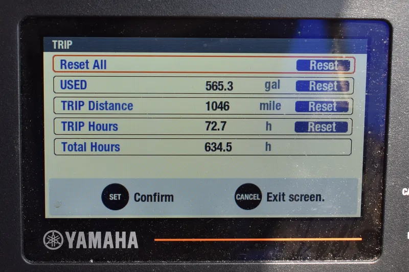 Slide: The Image of Yamaha display showing trip data: 565.3 gallons used, 1046 miles, 72.7 trip hours. Ranger Tugs R-27. - 39