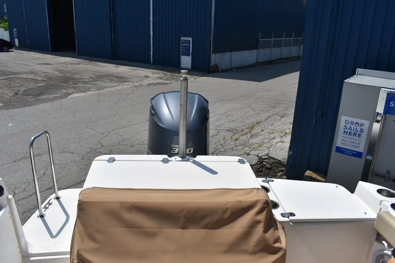Slide: The Image of 2019 Ranger Tugs R-27 boat stern with Yamaha 300 outboard motor in marina setting. - 15