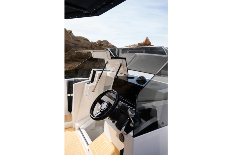 Slide: The Image of 2027 De Antonio Yachts D29 cockpit with sleek design and modern controls. - 14