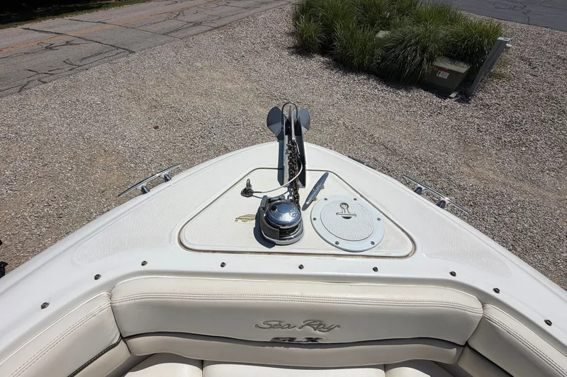 Slide: The Image of 2008 Sea Ray 290 SLX boat bow with anchor and seating area. - 26