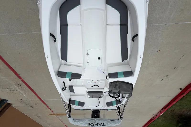 Slide: The Image of Overhead view of a 2027 Tahoe T16 boat with sleek seating and modern design. - 13