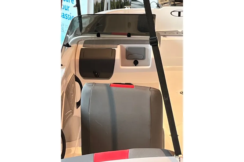 Slide: The Image of Interior view of 2027 Tahoe T21 boat, featuring seating and dashboard details. - 6