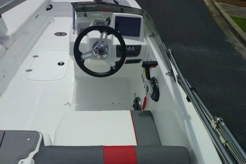 Slide: The Image of 2027 Tahoe T18 boat cockpit with steering wheel and control panel. - 4