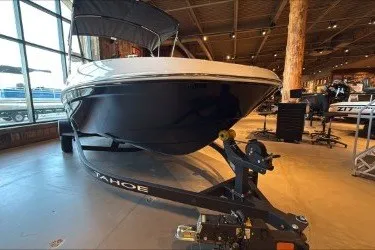 Slide: The Image of 2027 Tahoe T18 boat displayed indoors on a trailer. - 5