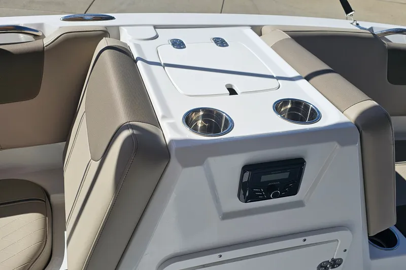Slide: The Image of Interior of 2027 Tahoe 1950 boat with cup holders and audio system. - 13