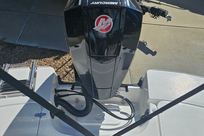 Slide: The Image of Outboard motor on a 2027 Tahoe 1950 boat, featuring a Mercury engine. - 15