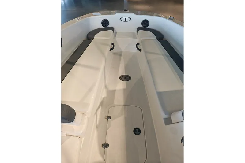 Slide: The Image of 2027 Tahoe T18 boat interior with seating and storage compartments. - 11
