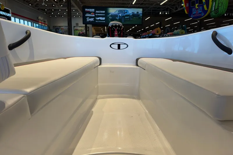 Slide: The Image of Interior view of a 2027 Tahoe T16 boat, showcasing seating and design features. - 65