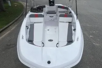 Slide: The Image of 2027 Tahoe T18 boat with sleek white design and spacious seating. - 8