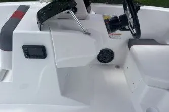 Slide: The Image of 2027 Tahoe T18 boat interior with steering wheel and control panel. - 1