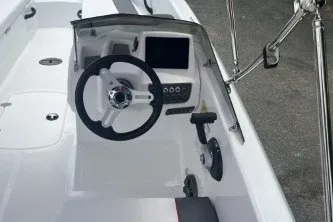 Slide: The Image of 2027 Tahoe T18 boat cockpit with steering wheel and control panel. - 5