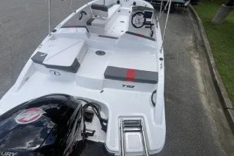 Slide: The Image of 2027 Tahoe T18 boat with sleek design, spacious seating, and powerful engine on display. - 7