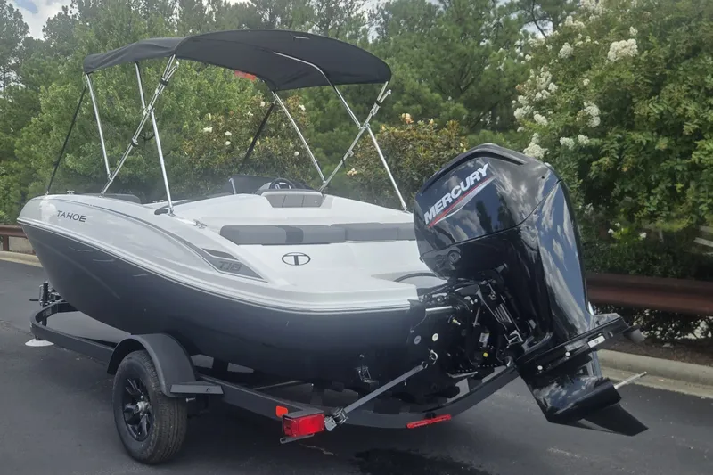 Slide: The Image of 2027 Tahoe T18 boat with Mercury outboard motor on a trailer. - 4