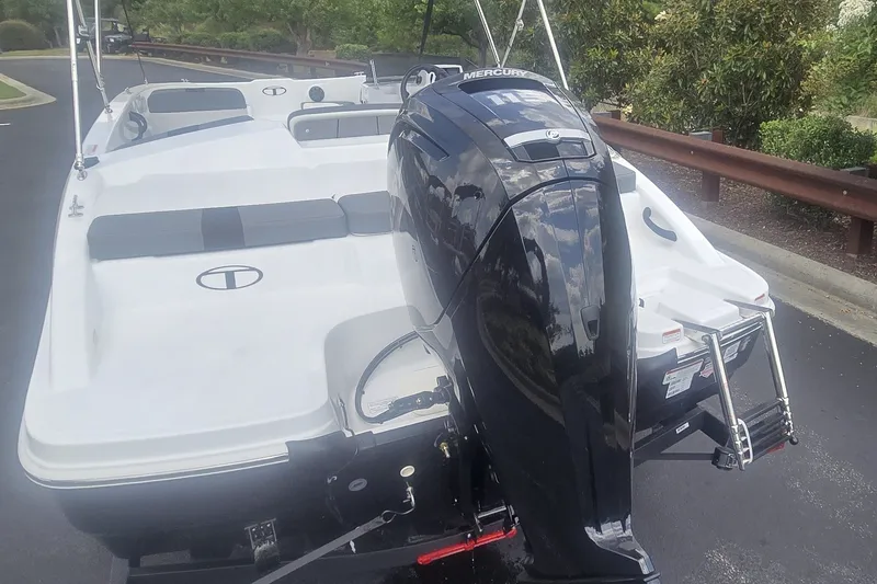 Slide: The Image of 2027 Tahoe T18 boat with Mercury outboard motor on a trailer. - 3