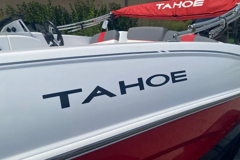 Slide: The Image of 2027 Tahoe T16 boat with sleek design and red accents. - 2
