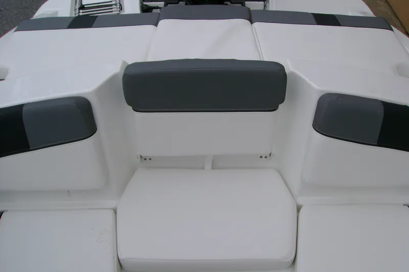 Slide: The Image of Rear seating area of 2027 Tahoe T16 boat with white and gray upholstery. - 11