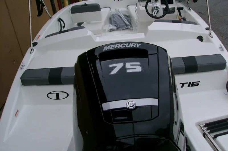 Slide: The Image of 2027 Tahoe T16 boat with Mercury 75 engine, featuring sleek white and black design. - 8