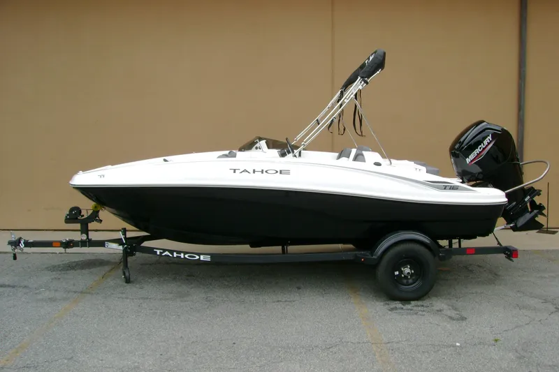 Slide: The Image of 2027 Tahoe T16 boat on trailer, featuring sleek design and Mercury outboard motor. - 1