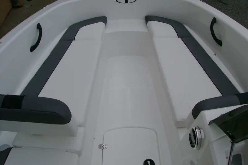 Slide: The Image of Interior view of a 2027 Tahoe T16 boat with cushioned seating. - 13