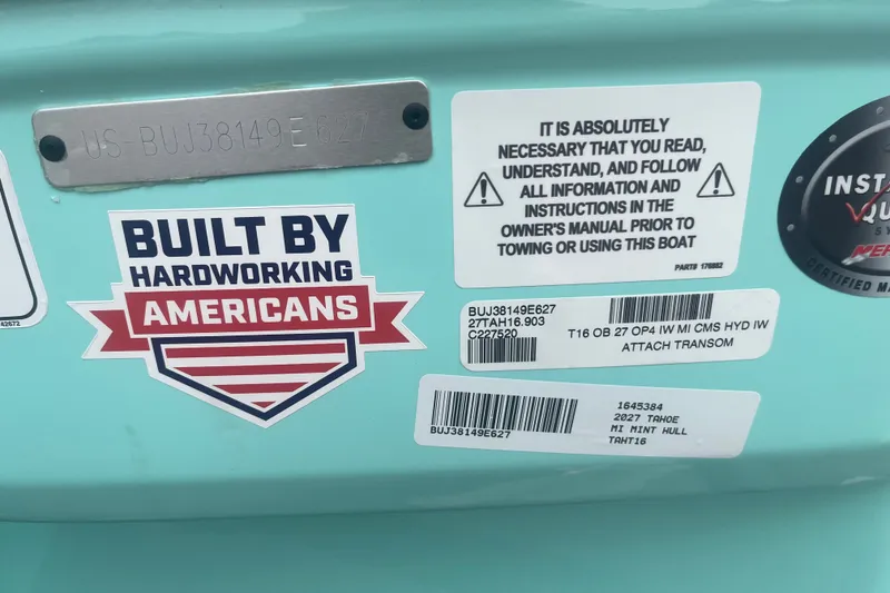 Slide: The Image of 2027 Tahoe T16 boat with safety instructions and 'Built by Hardworking Americans' sticker. - 9