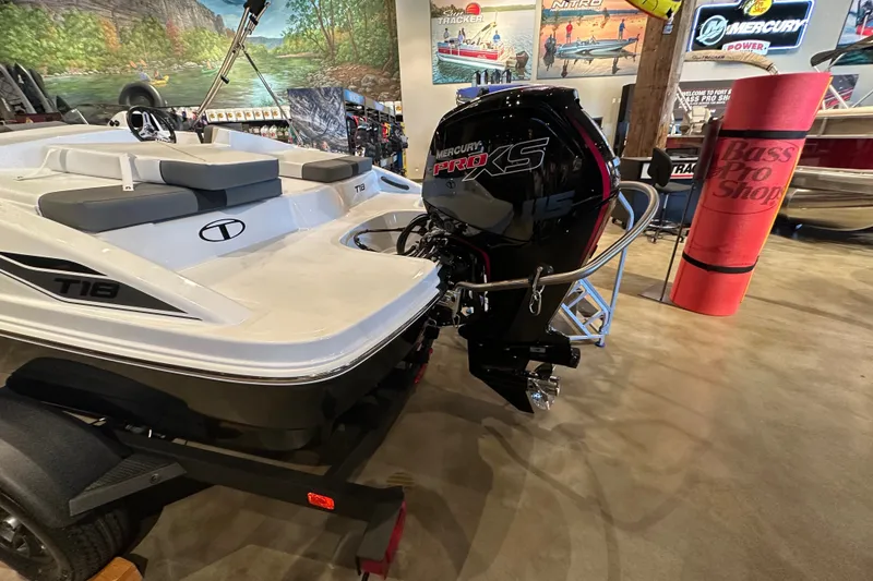 Slide: The Image of 2027 Tahoe T18 boat with Mercury Pro XS engine displayed at Bass Pro Shops. - 70