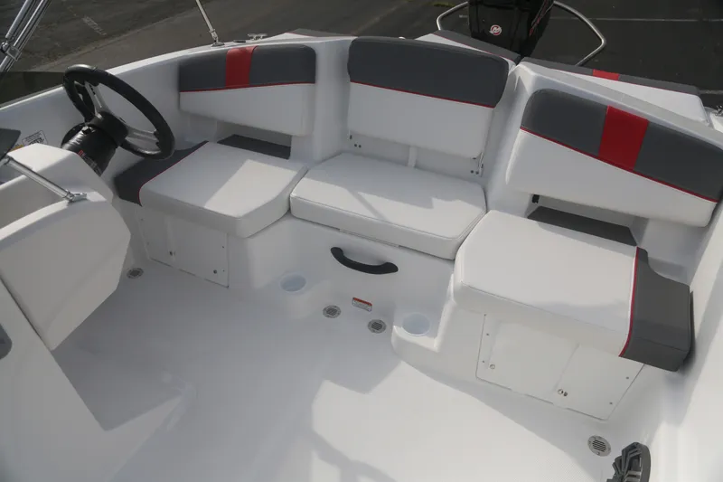 Slide: The Image of Interior seating of 2027 Tahoe T18 boat with modern design and red accents. - 6
