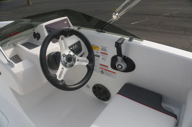 Slide: The Image of 2027 Tahoe T18 boat cockpit with steering wheel and control panel. - 4