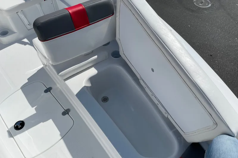 Slide: The Image of Interior of 2027 Tahoe T16 boat showing storage compartment and seating. - 12
