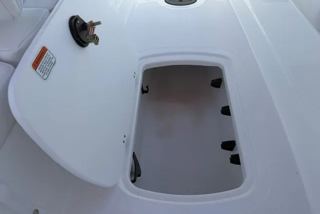 Slide: The Image of Open storage compartment on 2027 Tahoe T18 boat deck. - 11