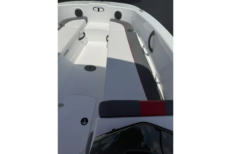 Slide: The Image of 2027 Tahoe T18 boat interior with sleek seating and modern design. - 13