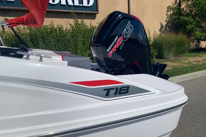 Slide: The Image of 2027 Tahoe T18 boat with Mercury Pro XS engine, parked outdoors. - 4