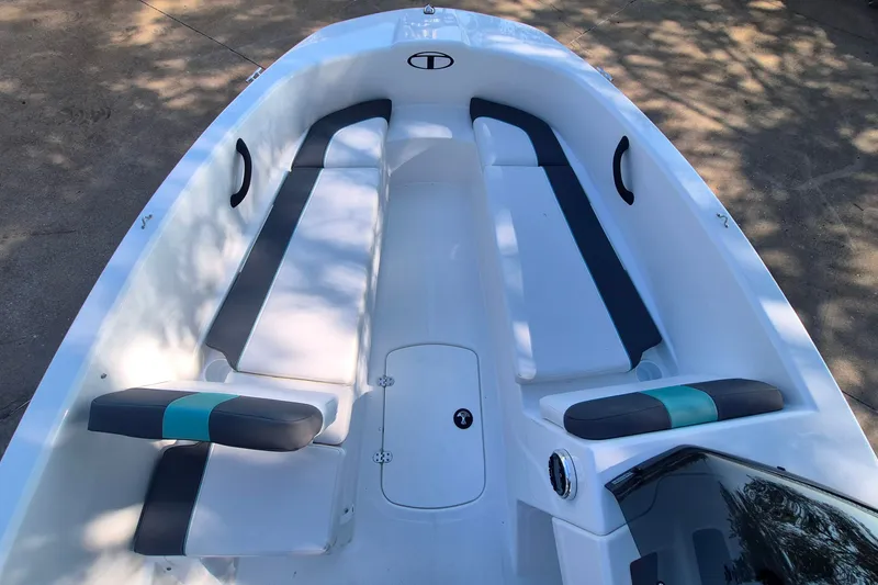 Slide: The Image of 2027 Tahoe T16 boat interior with sleek seating and modern design. - 12