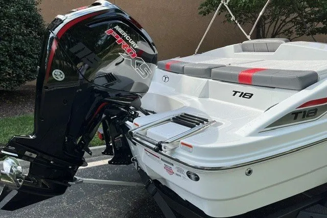 Slide: The Image of 2027 Tahoe T18 boat with Mercury Pro XS engine, featuring sleek design and modern seating. - 8